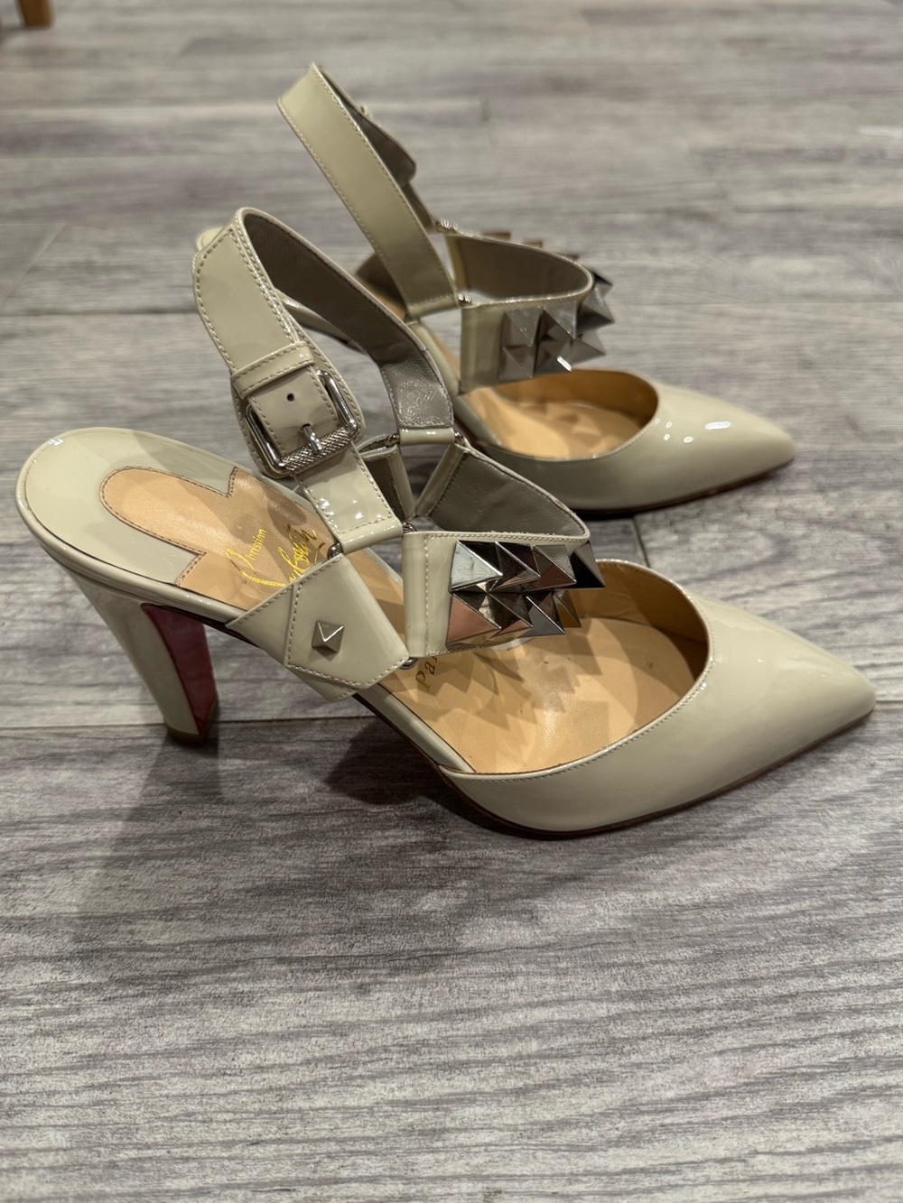 Christian Louboutin beige Ziggoo 85 patent leather spiked pumps